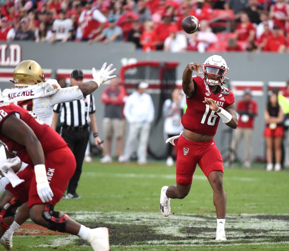 Nov 12, 2022; Raleigh, North Carolina, USA; North Carolina State Wolfpack quarterback MJ Morris (16) throws a pass during the first half against the Boston College Eagles at Carter-Finley Stadium. Mandatory Credit: Rob Kinnan-USA TODAY Sports