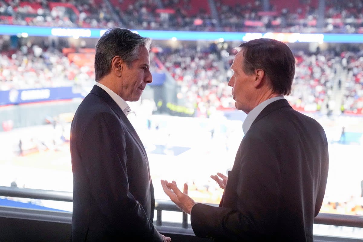 Antony Blinken and US ambassador to China Nicholas Burns attend a basketball game between the Shanghai Sharks and the Zhejiang Golden Bulls (Getty)