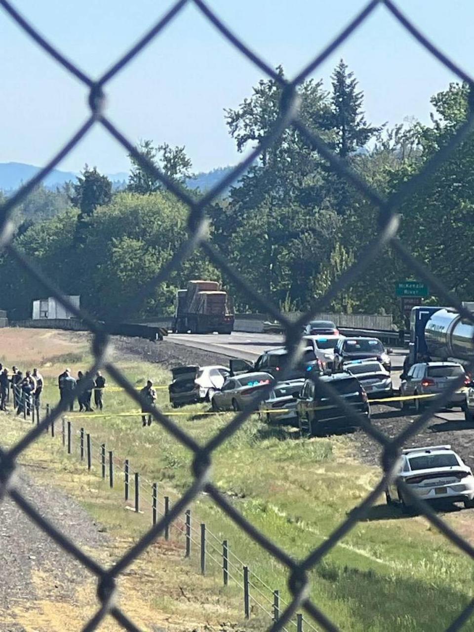 A KEZI 9 News crew films the aftermath of a high speed chase near Eugene, Ore. involving suspected West Richland killer Elias Huizar. KEZI 9 News/ KEZI 9 News