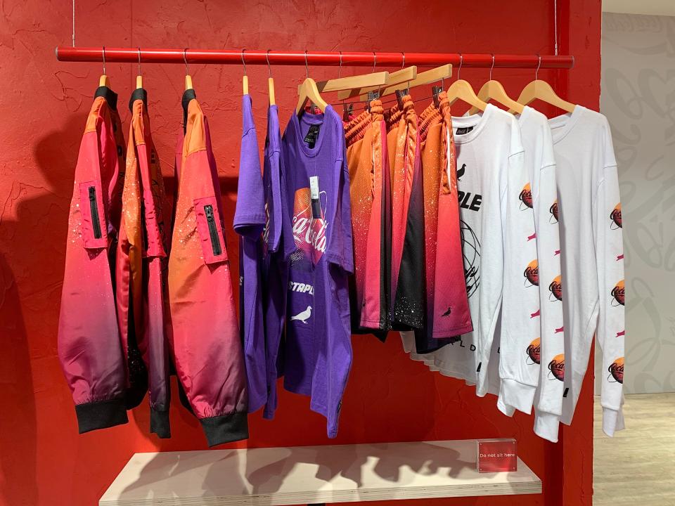 The clothing rails inside the Coca-Cola store in Covent Garden, London.