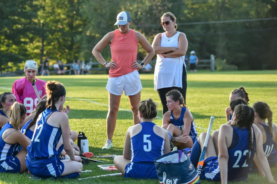 Colchester Coach Shawn Lefebvre goes over a few details with her team at halftime during the Lakers' 2-1 win over the Mount Mansfield Cougars earlier this season in Jericho.