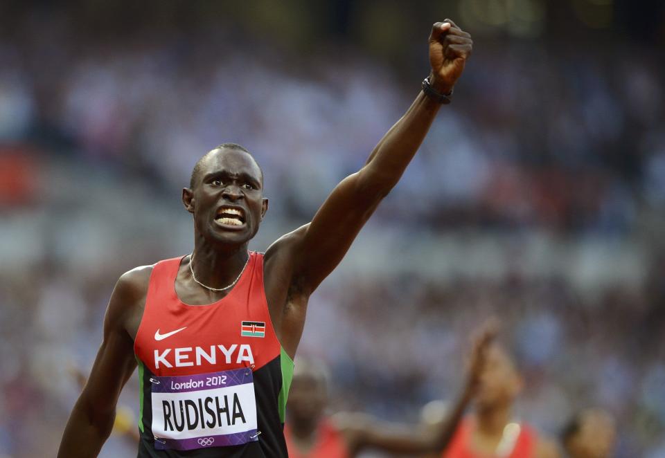 Kenya's David Lekuta Rudisha reacts after he won gold in the men's 800m final during the London 2012 Olympic Games at the Olympic Stadium August 9, 2012. Rudisha also set a new world record time of one minute 40.91 seconds in the 800m final. REUTERS/Dylan Martinez (BRITAIN - Tags: OLYMPICS SPORT ATHLETICS TPX IMAGES OF THE DAY)