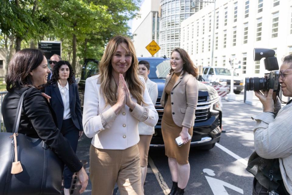 Daedone, seen after her arrest in June last year, has employed $1,000-an-hour lawyers to fight her case as she protests her innocence. She is scheduled to be back at Brooklyn Federal Court (right) in January next year for her trial. AP