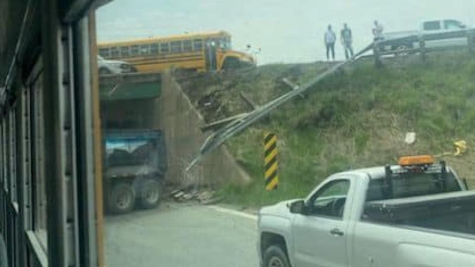 Matthew Baird says his stepson took this photo from inside the school bus Thursday afternoon after the tractor-trailer crashed through the guardrail on Highway 101.