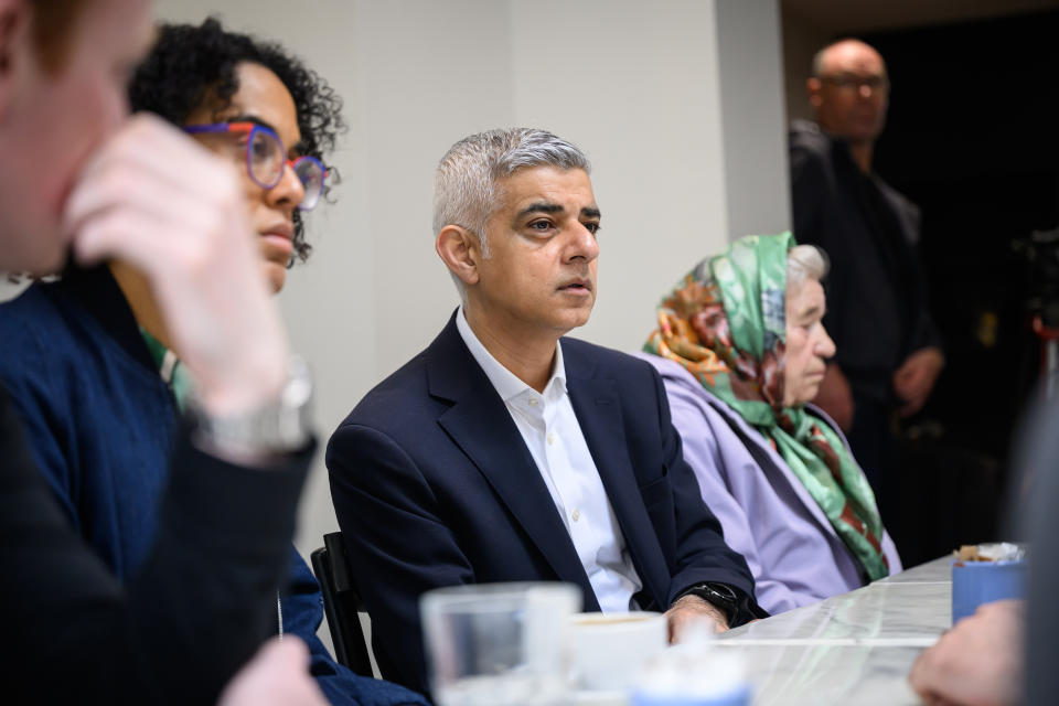 LONDON, ENGLAND - APRIL 04: Mayor of London Sadiq Khan (C) speaks with a group of people who have experienced difficulties and unfair treatment from private landlords, during the launch of his 
