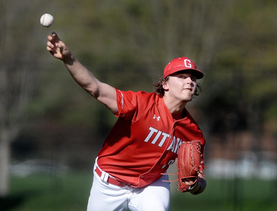 Parker Detmers, senior pitcher for Chatham Glenwood High School, pitches during the game against Sacred Heart-Griffin Wednesday, April 12, 2023.
