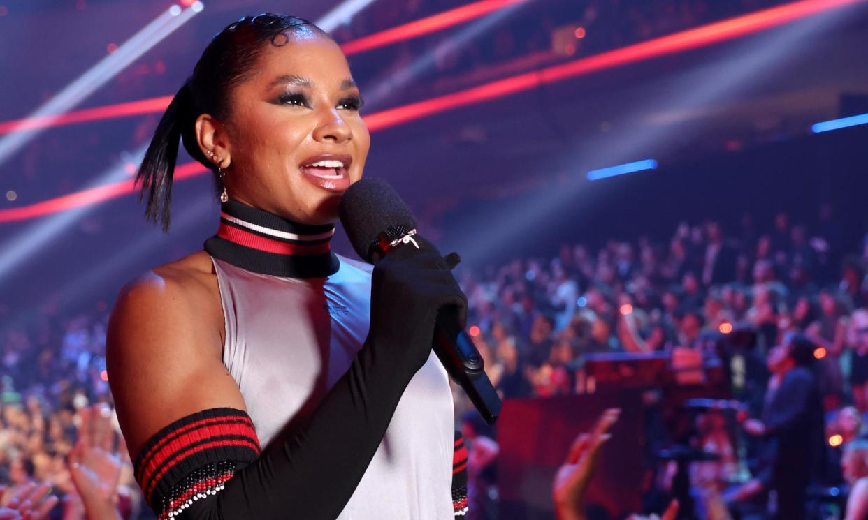 <span>Jordan Chiles speaks on stage during the MTV Video Music Awards in New York on Wednesday.</span><span>Photograph: Johnny Nunez/Getty Images for MTV</span>