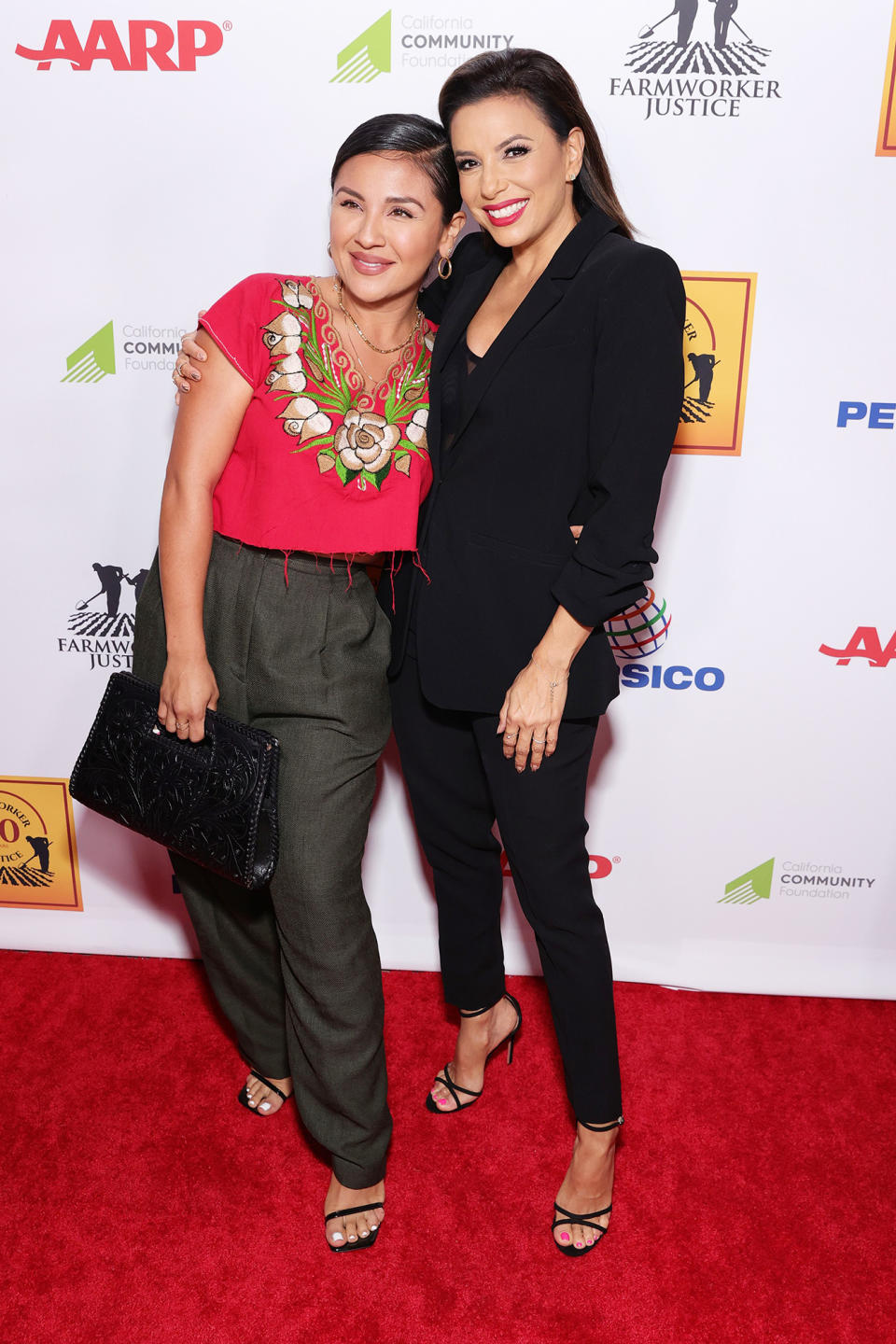 <p>Annie Gonzalez and honoree Eva Longoria kick off Hispanic Heritage Month at the Farmworker Justice Awards at La Plaza de Cultura y Artes on Sept. 14 in L.A. </p>