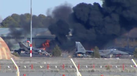 Smoke rises after a Greek F-16 fighter plane crashed during NATO training at the Albacete air base in Albacete in this still image from a January 26, 2015 video. REUTERS/RTVE