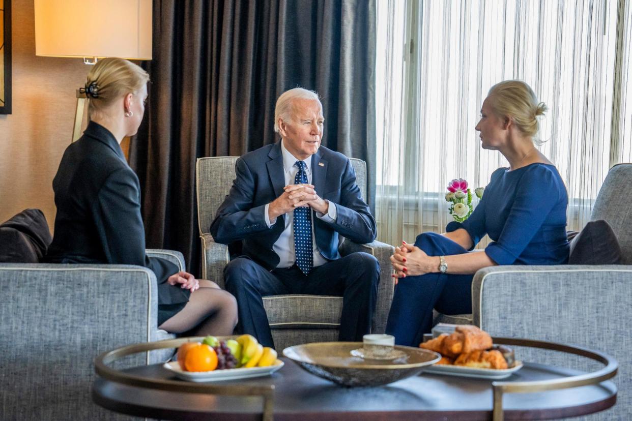 <span>Joe Biden meets with Yulia Navalnaya, right, widow of Alexei Navalny, and daughter Dasha Navalnaya, in San Francisco, California, on 22 February 2024.</span><span>Photograph: White House via AFP - Getty Images</span>
