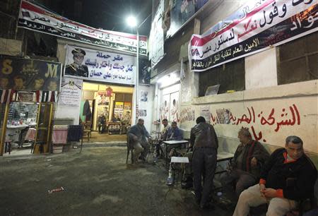 Posters of Army chief Abdel Fattah al-Sisi adorn the walls of an area of Cairo's Gamaliya district, where he spent his childhood January 21, 2014. Three years after the "Arab Spring" toppled Hosni Mubarak, a secretive general with a cult-like following is expected to announce his candidacy for the presidency of Egypt ahead of elections which he is expected to win easily. REUTERS/ Mohamed Abd El Ghany