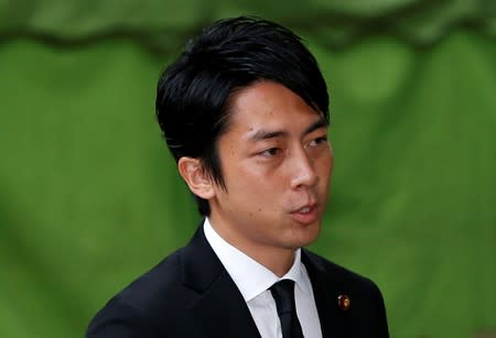 Shinjiro Koizumi, a Japanese lawmaker from the ruling Liberal Democratic Party and son of former Prime Minister Junichiro Koizumi, leaves after visiting the Yasukuni Shrine in Tokyo