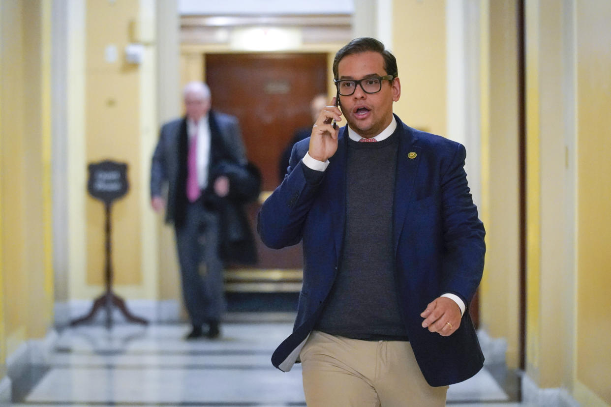 FILE - Rep. George Santos, R-N.Y., departs Capitol Hill in Washington, Jan. 11, 2023. Santos is carrying on in Congress despite calls for him to resign. Santos admitted to fabricating many aspects of his life story, but the newly elected congressman is refusing calls to quit. (AP Photo/Patrick Semansky, File)