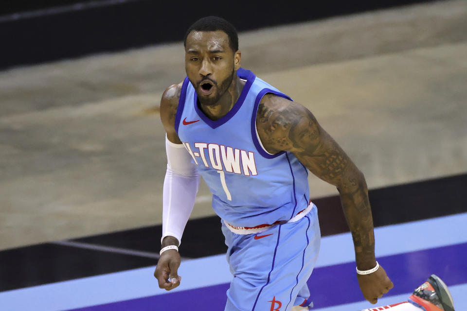 Houston Rockets' John Wall reacts during the second quarter against the Washington Wizards in an NBA basketball game Tuesday, Jan. 26, 2021, in Houston. (Carmen Mandato/Pool Photo via AP)