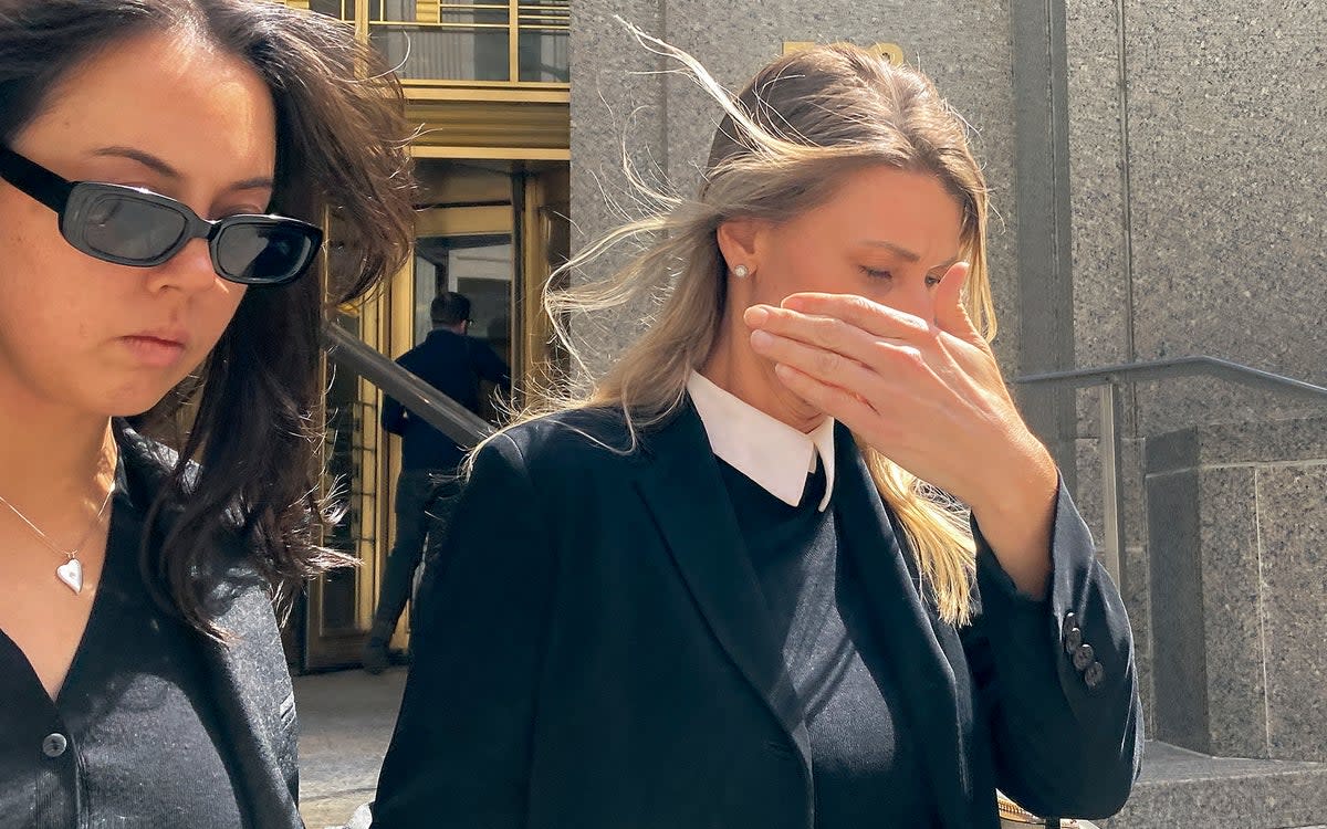 Aimee Harris, right, walking out of Manhattan federal court on 9 April, will spend one month in prison after stealing and selling Ashley Biden’s journal (AP)