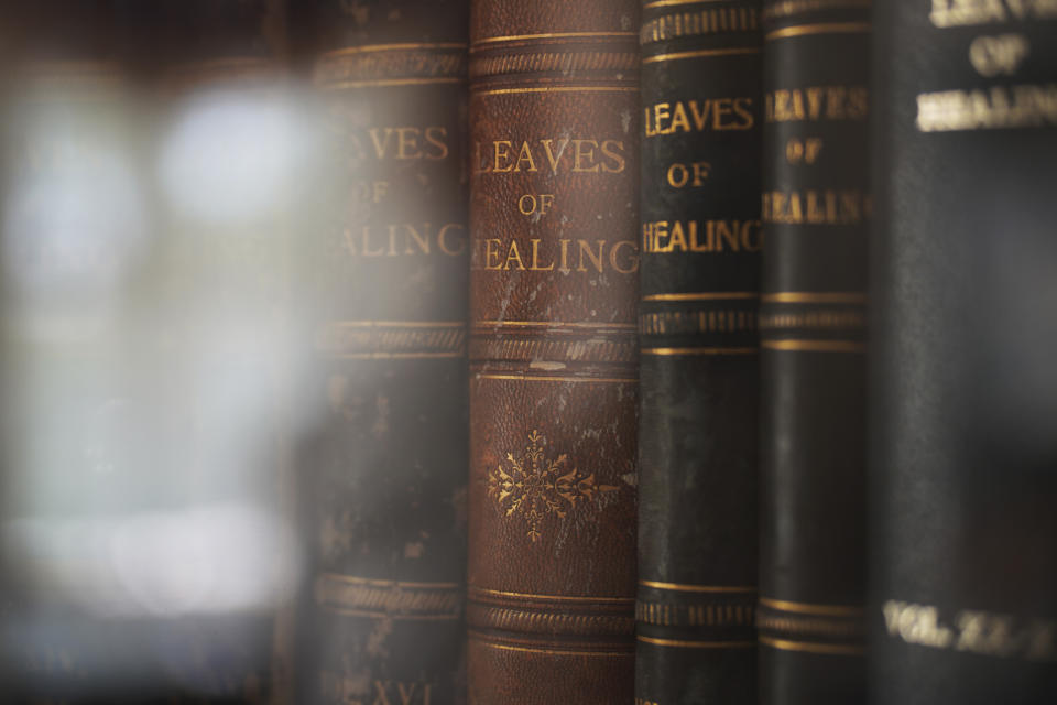 Issues of the "Leaves of Healing," a spiritual journal circulated worldwide, by faith healer and self-proclaimed "Elijah the Restorer," John Alexander Dowie, sit on display in the Historic Shiloh House in Zion, Ill., on Saturday, Sept. 17, 2022. While Dowie welcomed Black people and immigrants into Zion, he had harsh words for politicians, medical doctors and particularly, Muslims, which he expressed in his journal. This ultimately sparked the prayer duel between Dowie and the Ahmadiyya Muslim community's founder Mirza Ghulam Ahmad. (AP Photo/Jessie Wardarski)