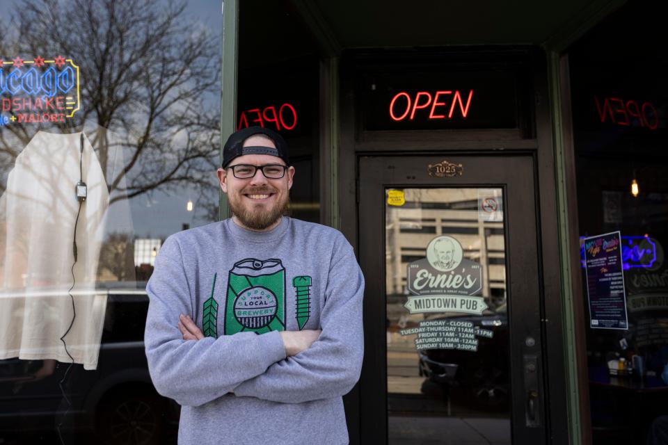 Owner of Ernie's Midtown Pub Andrew Vowles poses for a portrait in front of his pub on Wednesday, March 13, 2024, in Rockford.