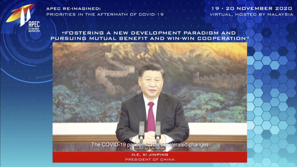 In this image from video released by APEC CEO Dialogues Malaysia 2020, China's President Xi Jinping, speaks at a CEO Dialogue forum via video link, ahead of the Asia-Pacific Economic Cooperation (APEC) leaders' summit, hosted by Malaysia, in Kuala Lumpur, Malaysia, Thursday, Nov. 19, 2020. (APEC CEO Dialogues Malaysia 2020 via AP)
