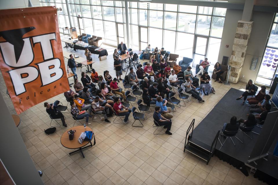 Audience members listen to a talk at the University of Texas of the Permian Basin&nbsp;Student Activity Center.