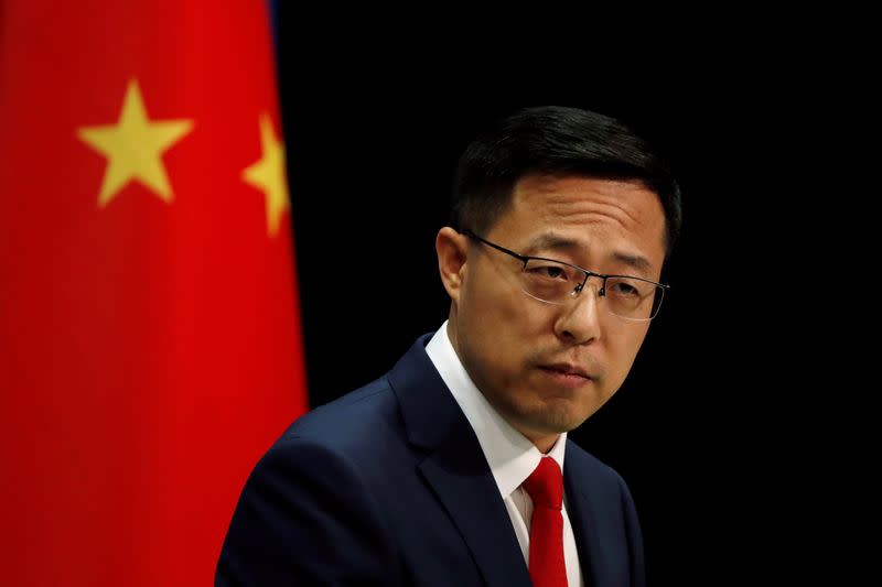 Chinese Foreign Ministry spokesman Zhao Lijian attends a news conference in Beijing, China