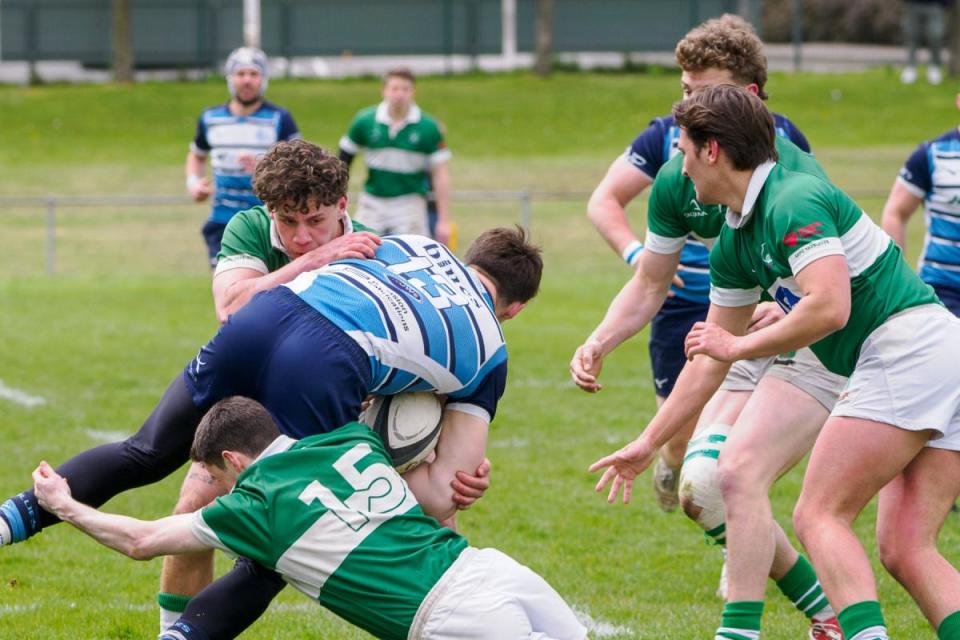 Centre Will Murley and fullback Rob Crossley combine to stop the Newbury centre in his tracks <i>(Image: John Palmer)</i>