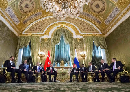 Members of Russian and Turkish delegations, led by Presidents Vladimir Putin (5th R) and Tayyip Erdogan (5th L), attend a meeting at the Kremlin in Moscow, Russia, March 10, 2017. REUTERS/Alexander Zemlianichenko/Pool