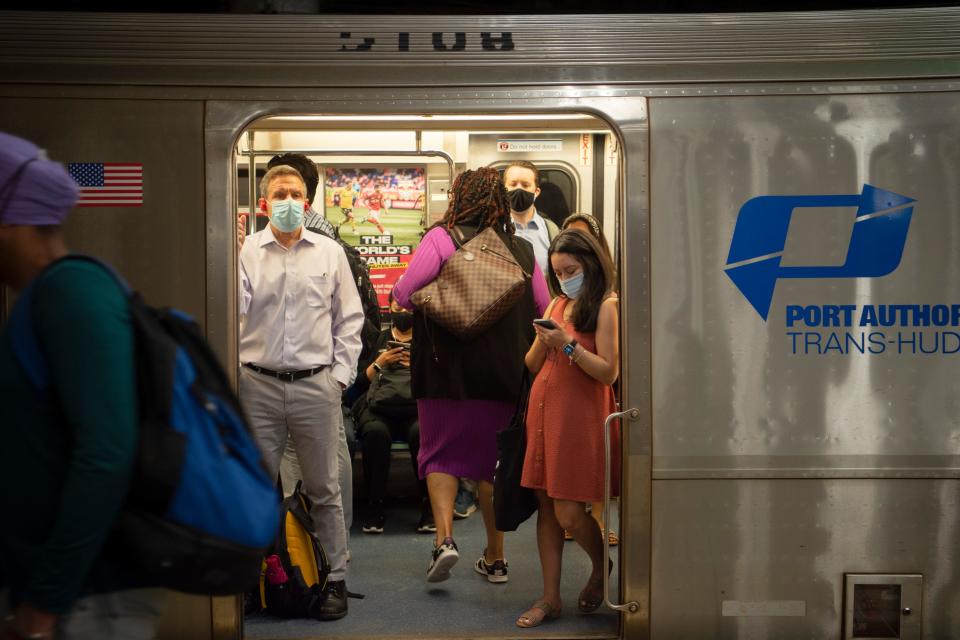 Commuters make their way through the Journal Square PATH Terminal in Jersey City on Wednesday,  June 15, 2022.