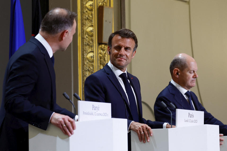 Polish President Andrzej Duda, left, French President Emmanuel Macron, center, and German Chancellor Olaf Scholz attend a joint press conference Monday, June 12, 2023 at the Elysee palace in Paris. Emmanuel Macron, German Chancellor Olaf Scholz and Polish President Andrzej Duda meet in Paris for talks focusing on military support for Ukraine's counteroffensive and future security guarantees to be given to the country, ahead of a NATO summit in July. (Sarah Meyssonnier, Pool via AP)