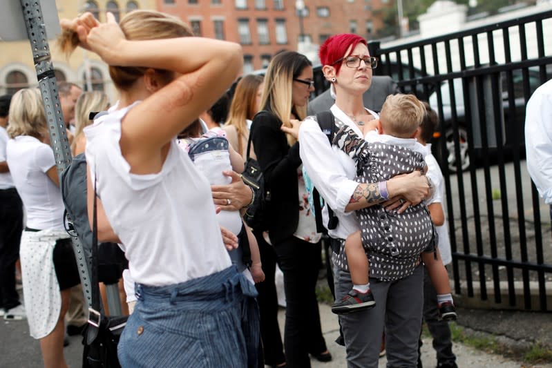 FILE PHOTO: Crowd of supporters rally outside court after hearing on religious exemption to vaccination in Albany