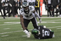 Philadelphia Eagles defensive end Josh Sweat (94) sacks New York Jets quarterback Zach Wilson (2) during the first half of an NFL football game, Sunday, Dec. 5, 2021, in East Rutherford, N.J. (AP Photo/Bill Kostroun)