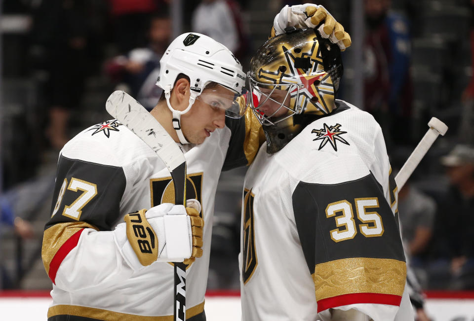 Vegas Golden Knights goalie Oscar Dansk (left) has made a touching upgrade to his helmet for the upcoming season. (AP Photo/Jack Dempsey)