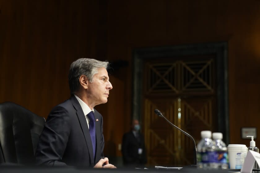 Secretary of State Antony Blinken listens during a Senate Foreign Relations Committee hearing Sept. 14, 2021.