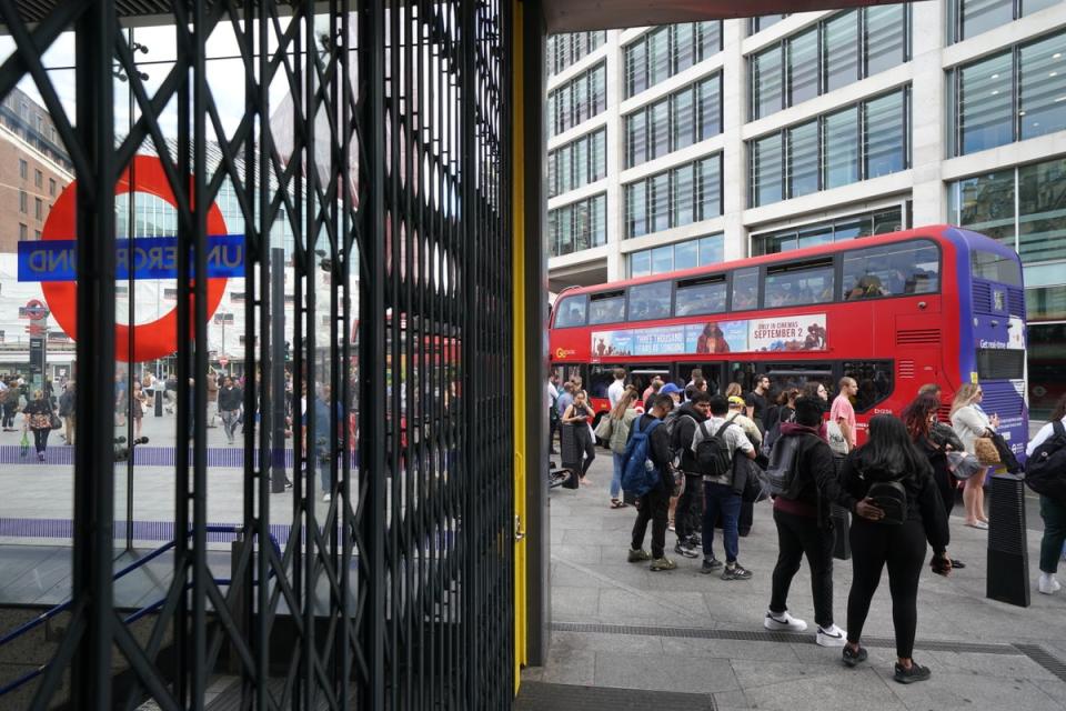 People waiting for buses outside Victoria station in central London (Kirsty O’Connor/PA) (PA Wire)