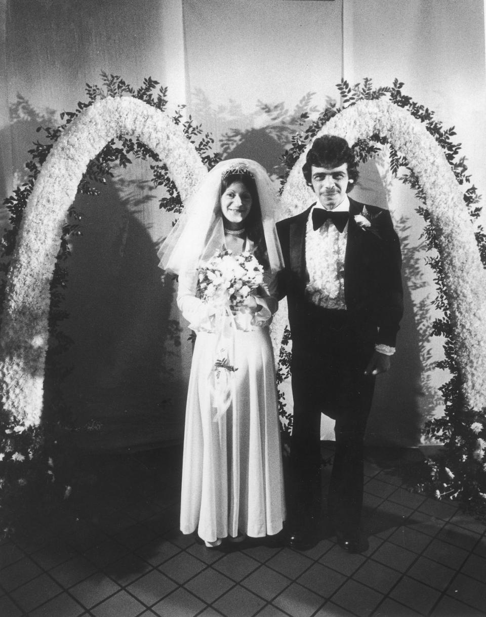 <p>McDonald's employee Annette Scaramozza married Anthony Francis in a McDonald's restaurant in east Boston. She wanted to host the nuptials there so she could share the day with her fellow employees. If we're being honest, those flower arches are everything.</p>