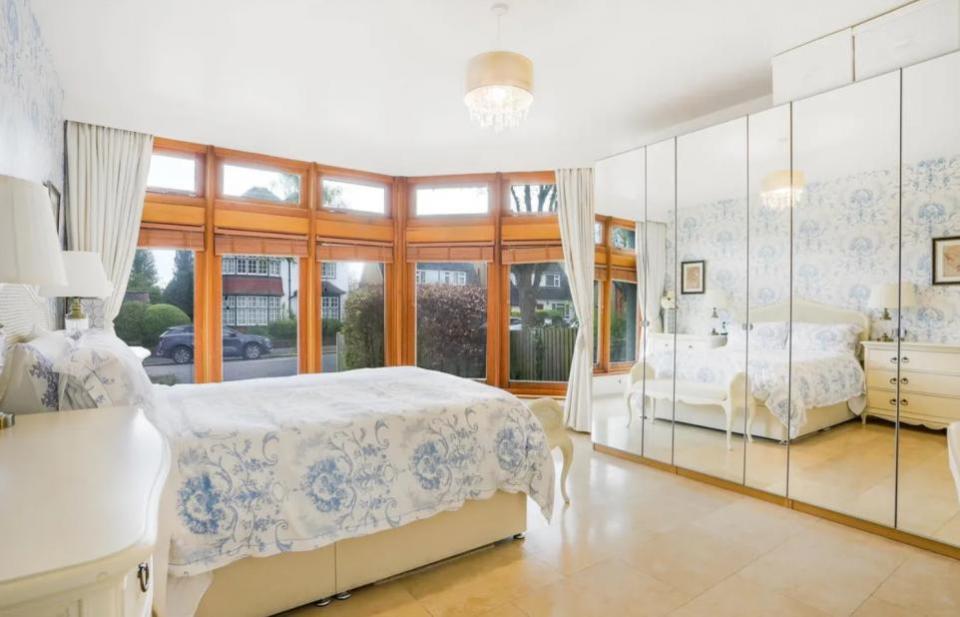 Your Local Guardian: The master bedroom has floor-to-ceiling windows