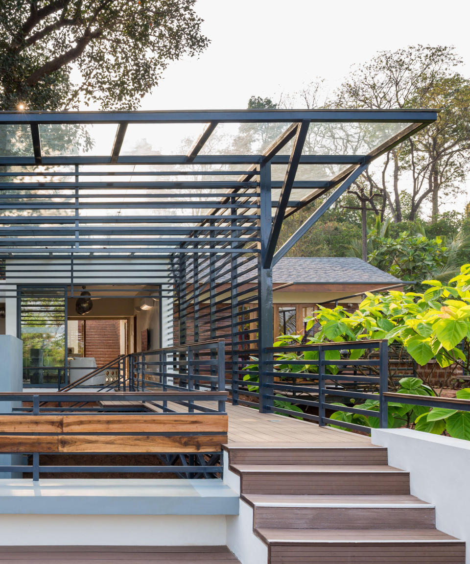 deck steps leading to modern house