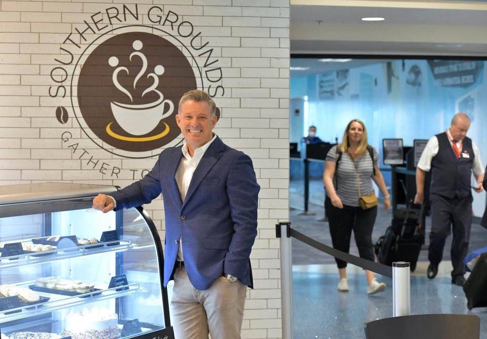 Mark Janasik, founder and owner, is shown in the newly opened second location of Southern Grounds at Jacksonville International Airport.