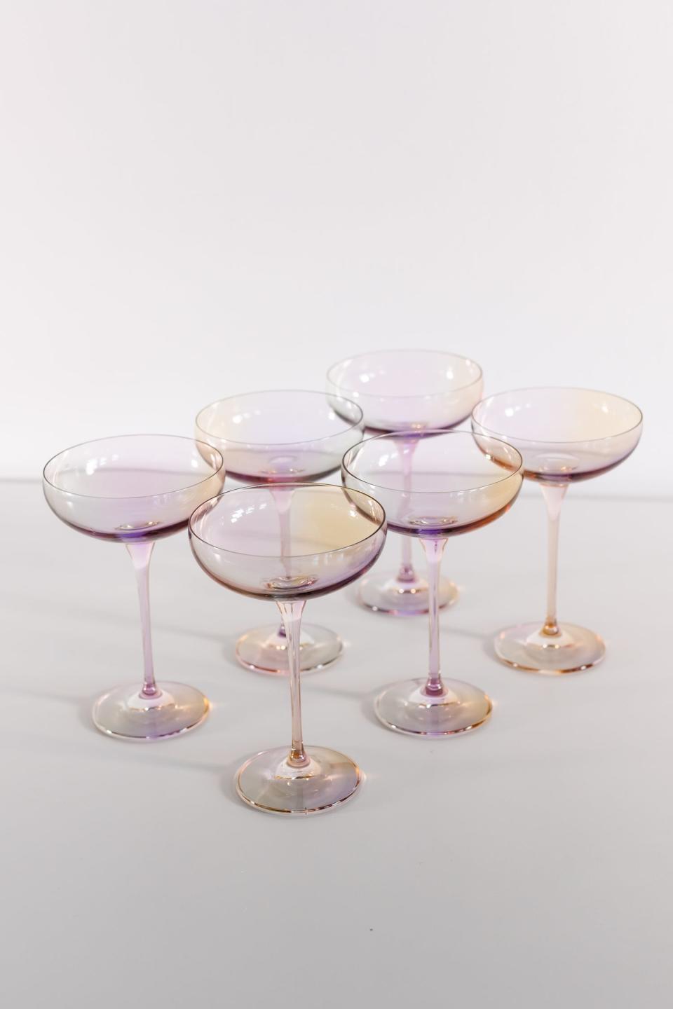 <p><a href="https://estellecoloredglass.com/collections/champagne-coupe/products/estelle-colored-champagne-coupe-stemware-set-of-6-iridescent" rel="nofollow noopener" target="_blank" data-ylk="slk:Shop Now;elm:context_link;itc:0;sec:content-canvas" class="link ">Shop Now</a></p><p>Coupe Stemware - Set of 6</p><p>estellecoloredglass.com</p><p>$205.00</p>