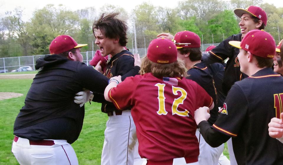 Michael Boutiette (capless) celebrates a 4-3 extra inning walk off win over Archbishop Williams, for which he produced the game winning RBI on Thursday, May 4, 2023.