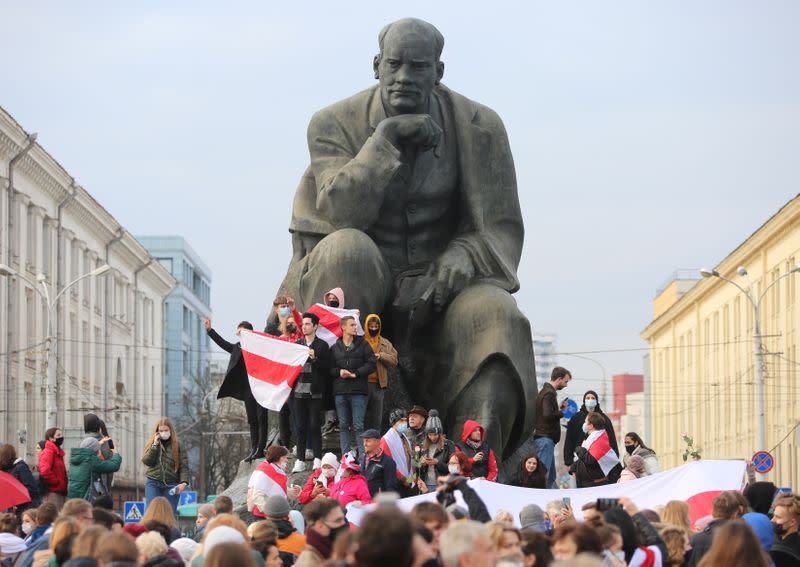 Belarusian opposition supporters hold a rally in Minsk