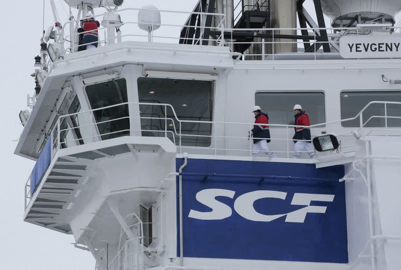 FILE PHOTO: The logo of Russian state shipping company Sovcomflot is seen on the multifunctional icebreaking standby vessel "Yevgeny Primakov" moored in central St. Petersburg