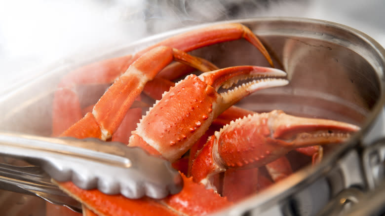 Boiled crab legs in pot