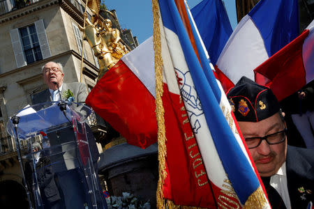 France's far right National Front party founder Jean-Marie Le Pen delivers a speech during the traditional May Day tribute to Joan of Arc (Jeanne d'Arc) in front of her statue in Paris. REUTERES/Philippe Wojazer