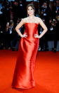 <p>Dakota turned to Dior for her shimmering, strapless red dress.<em> [Photo: Getty]</em> </p>