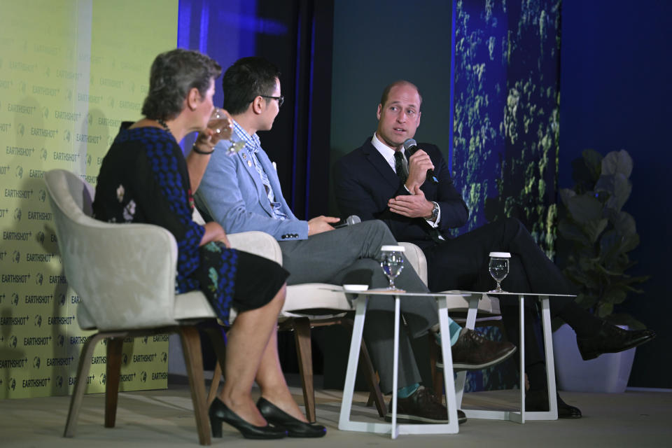 Britain's Prince William, right, takes part in a panel discussion on stage with Earthshot Prize trustee Christiana Figueres, left, and Brandon Ng of Ampd Energy at the Earthshot+ Summit at Park Royal Pickering in Singapore Wednesday, Nov. 8, 2023. William is on a four-day visit to Singapore, where he attended the Earthshot Prize 2023 that aims to reward innovative efforts to combat climate change. (Mohd Rasfan/Pool Photo via AP)