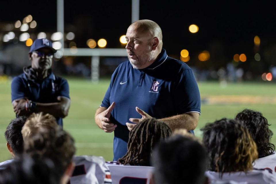 Pleasant Grove coach Josh Crabtree talks with his team after a game against the Laguna Creek Cardinals in 2022. Sara Nevis/snevis@sacbee.com