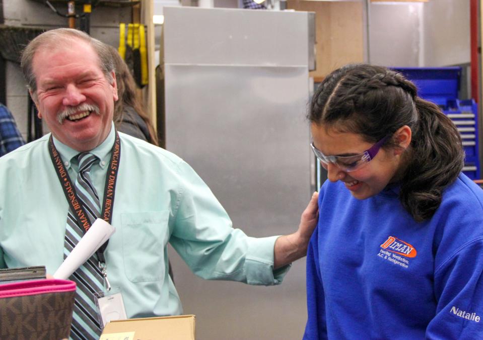 Diman Regional Vocational Technical High School Superintendent Brian Bentley speaks with student Natalie Raposa in the HVAC shop on Thursday, Feb. 29.