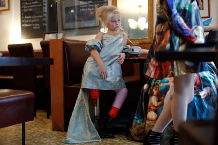 Model Daisy-May Demetre, 9 year-old double amputee who will walk the runway during Paris Fashion Week, is seen during a photo shoot a day before the luxury children's wear label Lulu et Gigi show in Paris