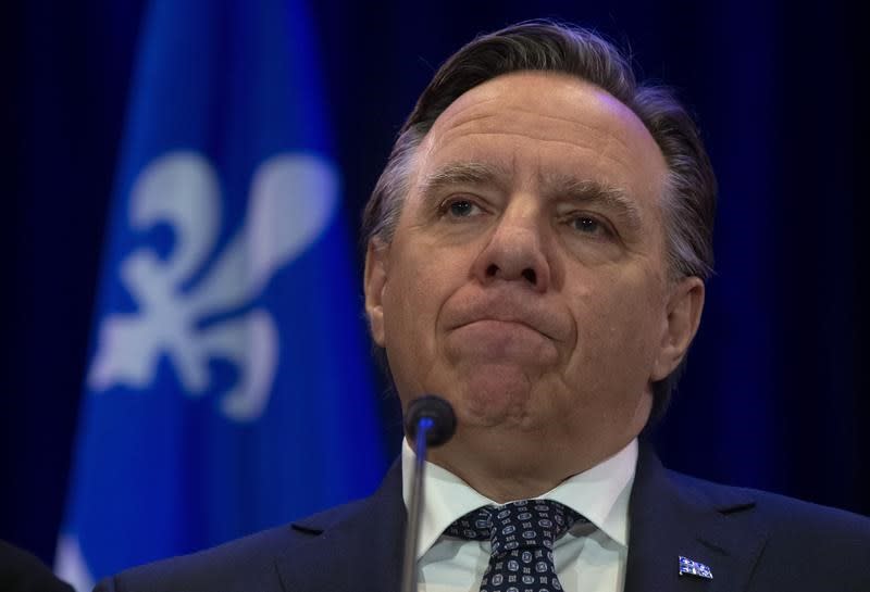 A day after bombshell claims by Canada’s former attorney general, the Quebec premier expressed concern about potential job losses and the province’s political class hesitated to take sides. (The Canadian Press)