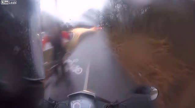 The cyclist is seen speeding down the cycle lane. Photo: LiveLeak